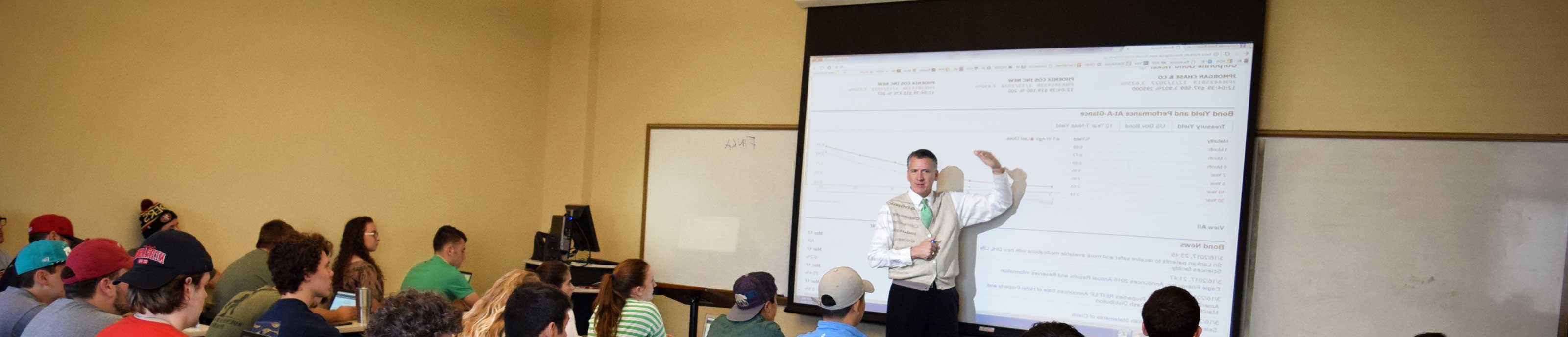Dr. Michael King teaches class