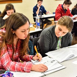 Students working on an assignment in class together