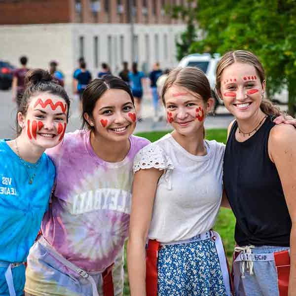 BCYC participants pose with face paint during Capture the Flag